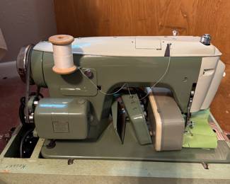Awesome sewing machine. Love the color