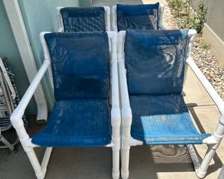 Patio furniture, plants, pots and yard art.