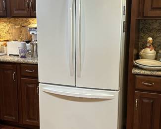 Kenmore French Door refrigerator with bottom freezer and ice maker. Ice cold.