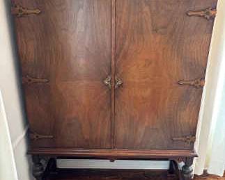 Jacobean Style Wood Cabinet With Ornate Strap Hinges