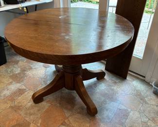 Antique Oak Table with extension leaf *Available for Presale* $150 Dimensions: 42" Diameter, 30"h 12" leaf