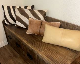 pillows and storage chest