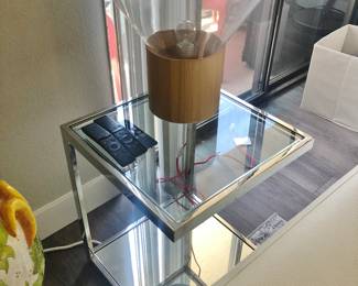 One of a Pair of Glass / Chrome Side Tables