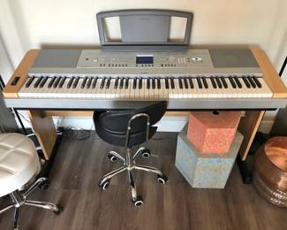 Yamaha Portable Grand Electric Keyboard with a Swivel Chair