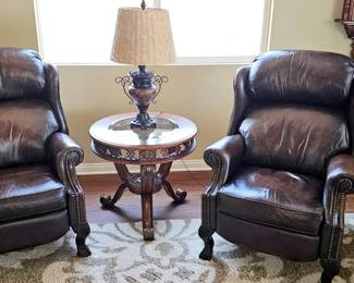 Leather chairs...huge area rug underneath