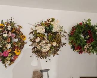Many wreaths and decorative flowers