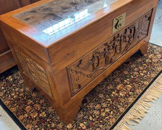 This beautiful carved Asian Chest with glass top is in excellent condition. Unique and well made