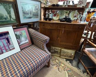 Wonderful Oak Mirrored buffet. Great Prints, some framed some matted. Plaid Love Seat with rolled arms. Excellent condition.