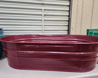 Galvanized wash tub that has been painted