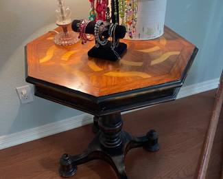 Accent table with mixed wood top and pedestal base, costume jewelry, vintage glass lamp