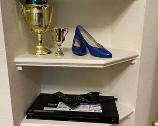 Sony Blue Ray player, shoes, trophies and office supplies