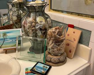 Shells in glass containers and art