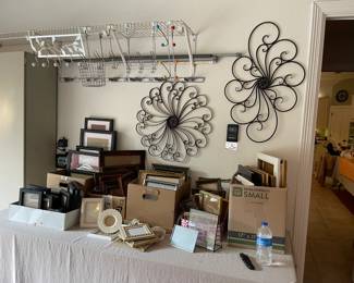 Lots of really great frames, metal scroll pieces, metal hooks
