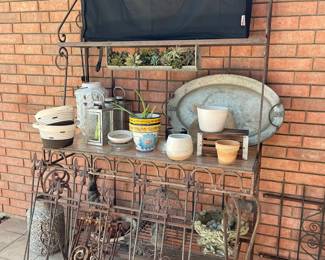 Iron Bakers Rack, lots of metal fence pieces, metal decorative pieces, pots and planters and TV