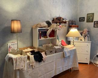 The blue bedroom full of vintage gloves, linens, hankies, hats, baby linens and clothing, vintage shoes, hat boxes