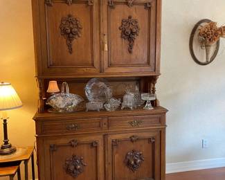 French walnut buffet with great carved details and lots of storage