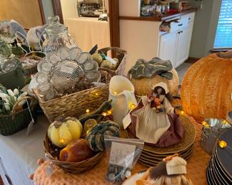 Devil egg plate, pumpkin candles, corn husk dolls and pumpkin dishes