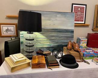 Modern glass lamp, bibles, art and games