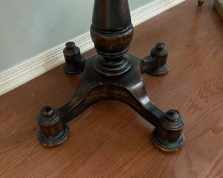 The pedestal base of the inlay table