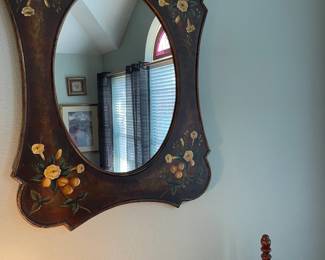 Wonderful round mirror in hand pained frame