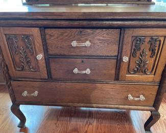 A closer look at the buffet's carved details