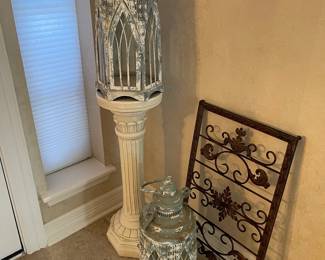 Pedestal, lanterns and metal decorative piece