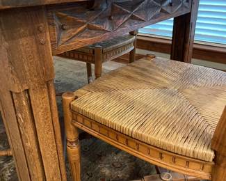 The leg and apron details of the oak table