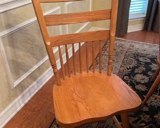Two dining chairs of this design
