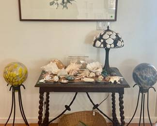 Japanese print, antique table, and shells