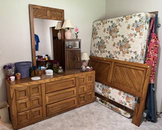 Dresser with mirror, bed with mattress