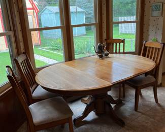 Dining table with four chairs.