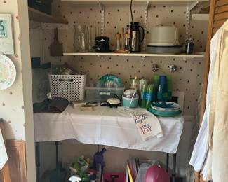 Laundry room supplies. Cleaning supplies. Plastic dishes and cups. Kitchen storage.