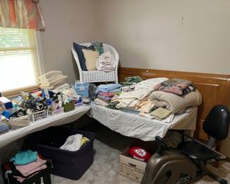 Linens. Toys. Bathroom items. Exercise bike.