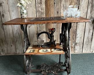 Repurposed 1800s sewing machine table