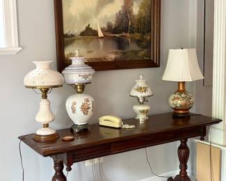Console table and globe lamps