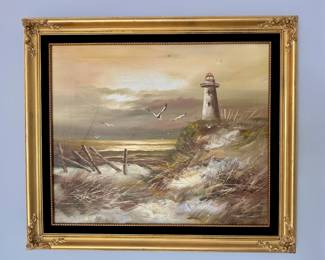Seascape/lighthouse painting in gold frame