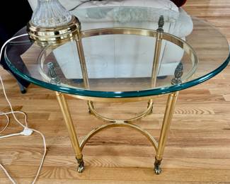 Oval glasstop and brass side table
