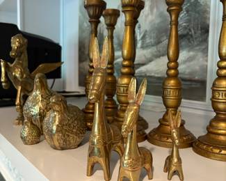 Brass candlesticks and animals