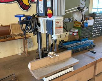 Shop Fox bench top mortising machine.