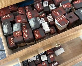 Edward H. Burley vintage rubber spin casting molds for lead miniatures — includes numbered molds used to produce military figures, WWII-era and Napoleonic themes.