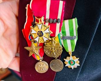 Vintage army and navy officer uniforms