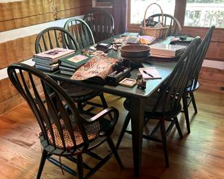 includes 8 chairs and 1 leaf for expansion. Zoom in on the color. sturdy. If purchased at full price it will included the woven seat pads, placemats & trivets.