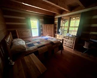 This long dresser and a corner closet. Main floor. Crafted in North Dakota. Most likely a queen size. Mattress goes with it.