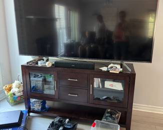 Large TV plus wooden tv stand