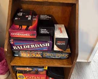 more board games and small wood shelf