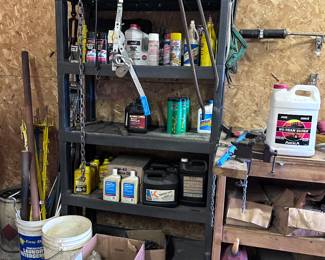 Garage supplies. Farm equipment. Garage shelving.