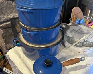 Le Creuset dutch ovens.