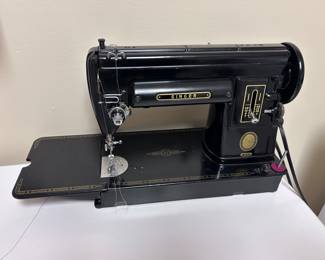 Singer Sewing machine.