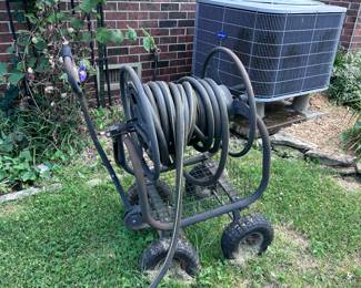 Garden hose and cart.