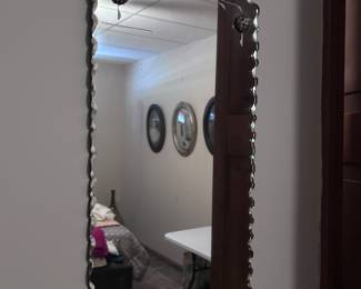 Scalloped mirror.